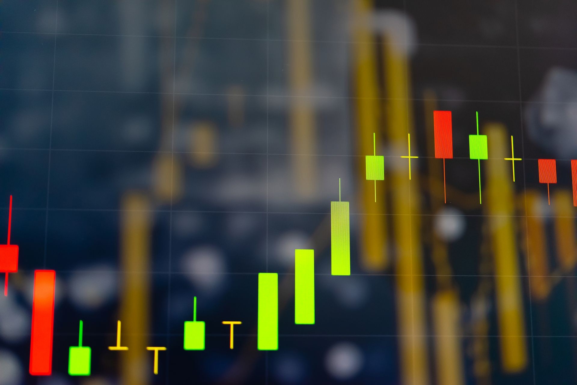 Abstract financial trading graphs and digital number on monitor. Background of gold and blue digital chart to represent stock market trend.